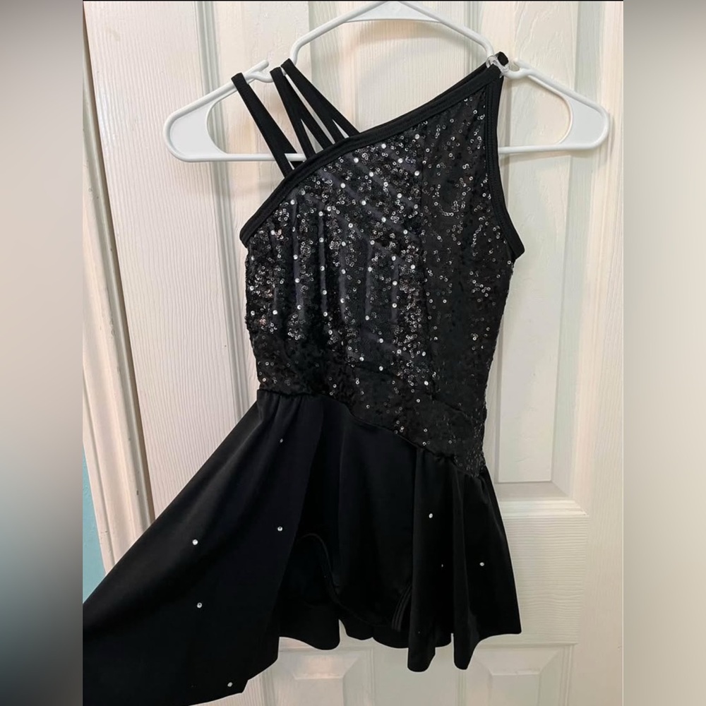Black sequin and rhinestone costume
Girls size medium